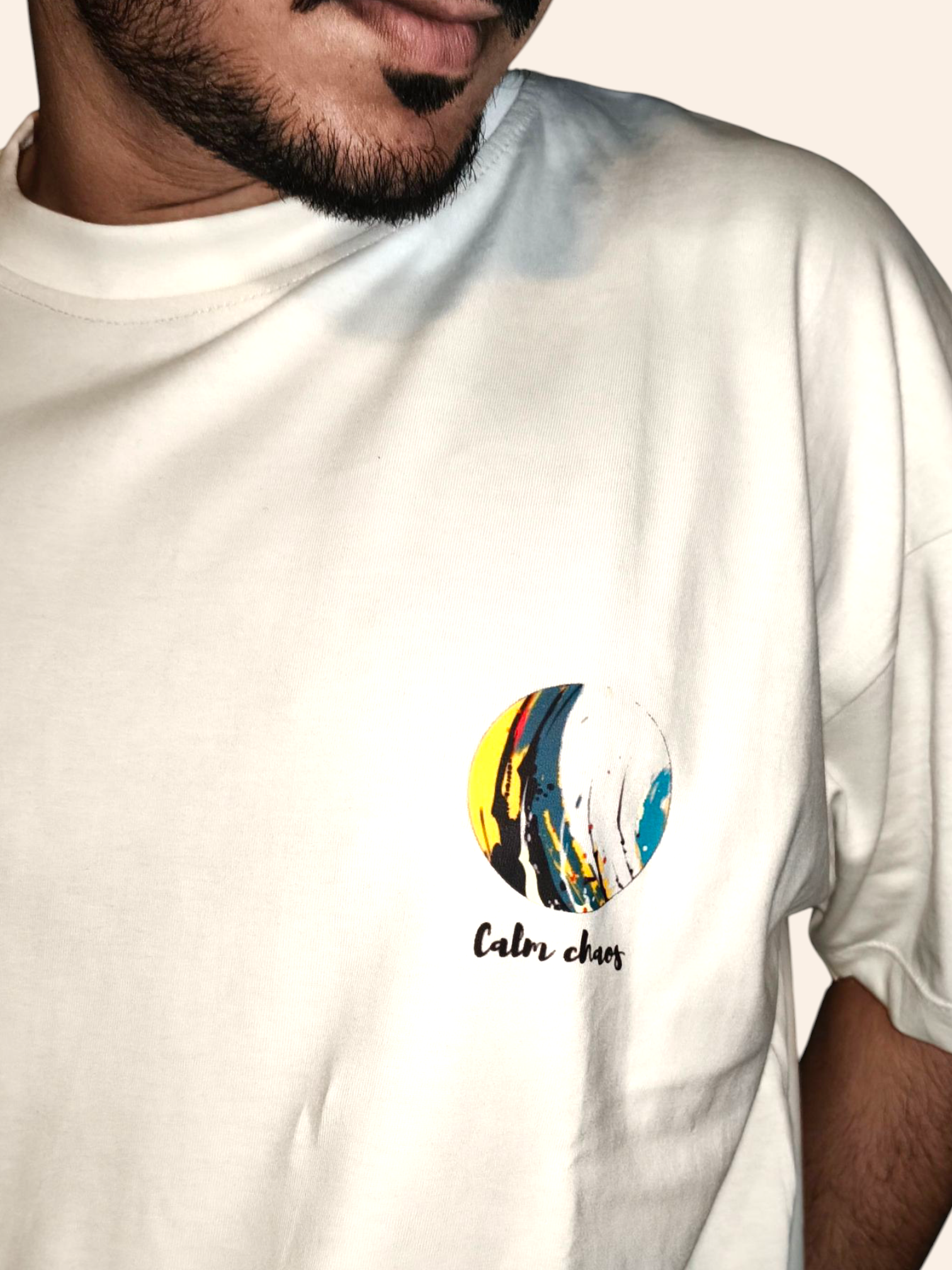 VeerAstra White t-shirt with a colorful logo and text on a person wearing it.