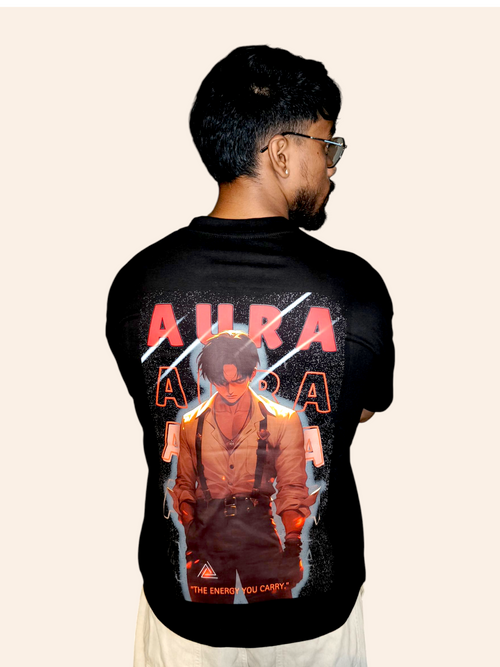 Person wearing a VeerAstra black t-shirt with a graphic design on the back, featuring the word 'Aura' and an illustration of a person.