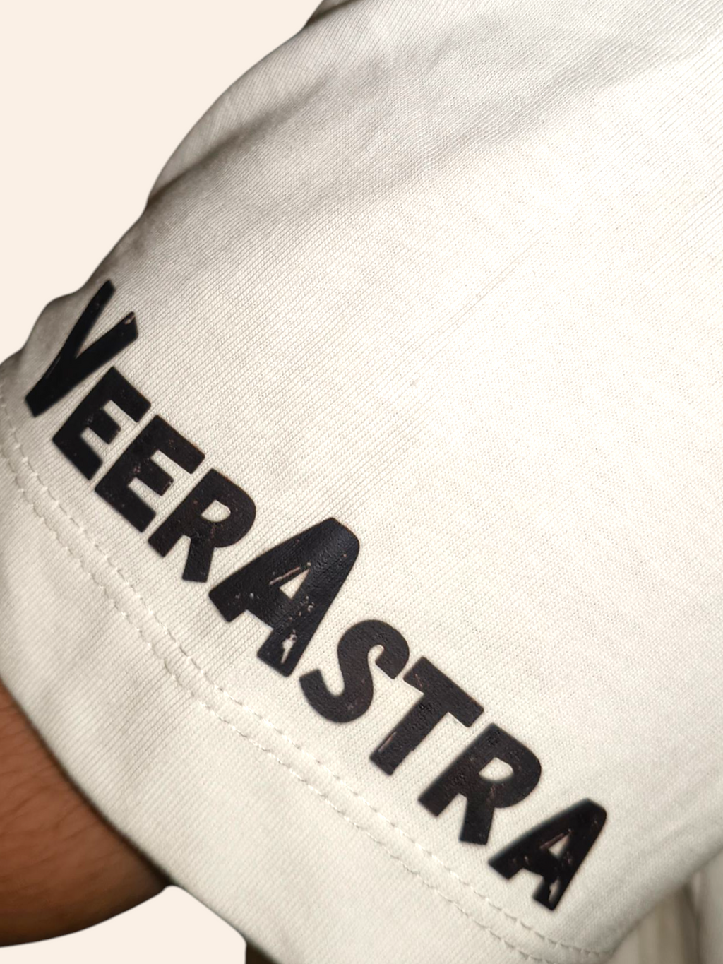 White sleeve with 'VEERASTRA' text on a white background