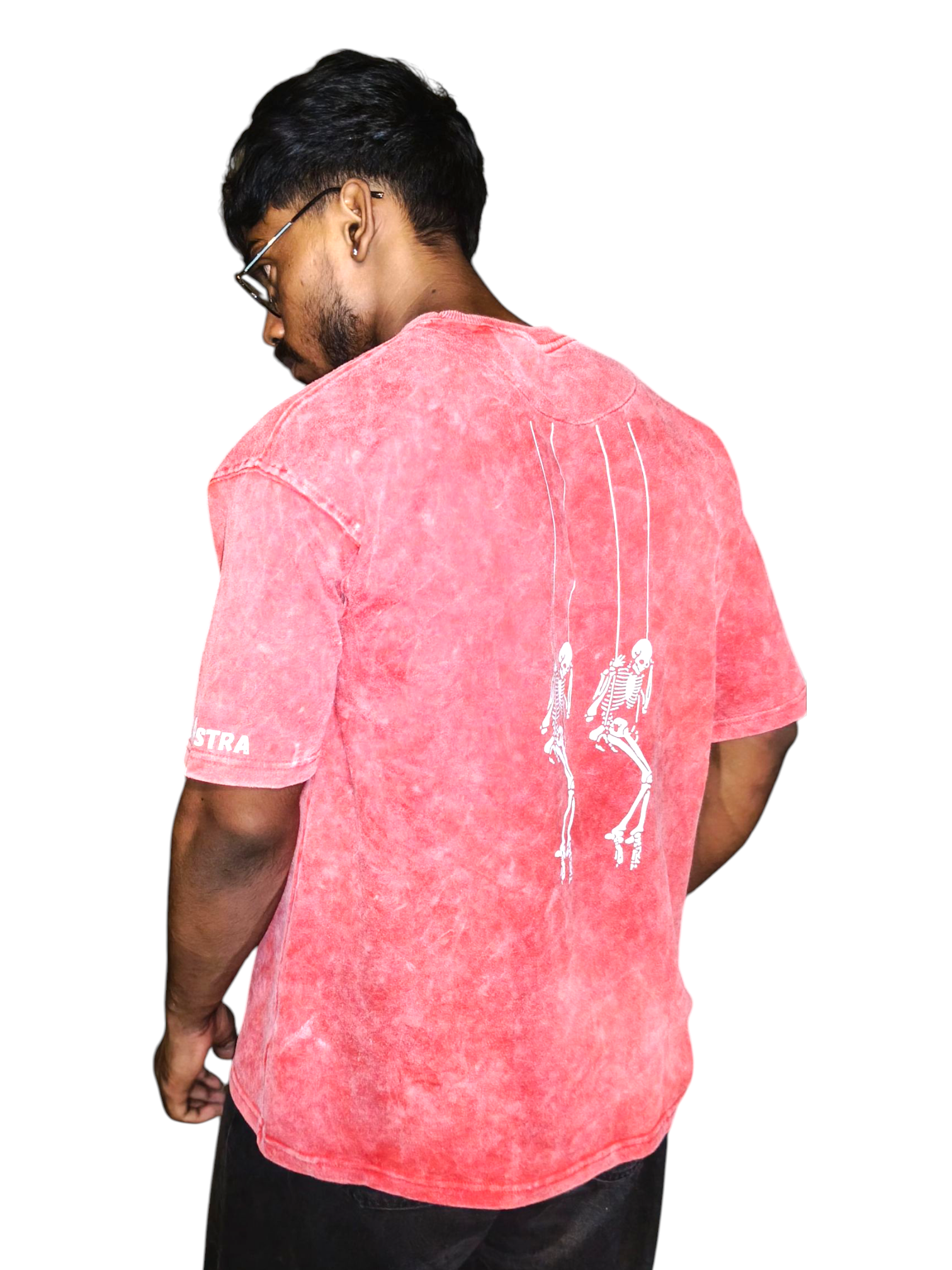 Person wearing a VeerAstra Red Acid Wash t-shirt with a white graphic on the back, standing against a white background.